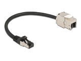 Delock Kabel RJ45 Stecker zu Keystone Modul RJ45 Buchse Cat.6A 25 cm schwarz