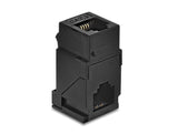 Delock Keystone Modul Kupplung RJ14 Buchse zu RJ14 Buchse 90° gewinkelt Cat.3 Kunststoff schwarz